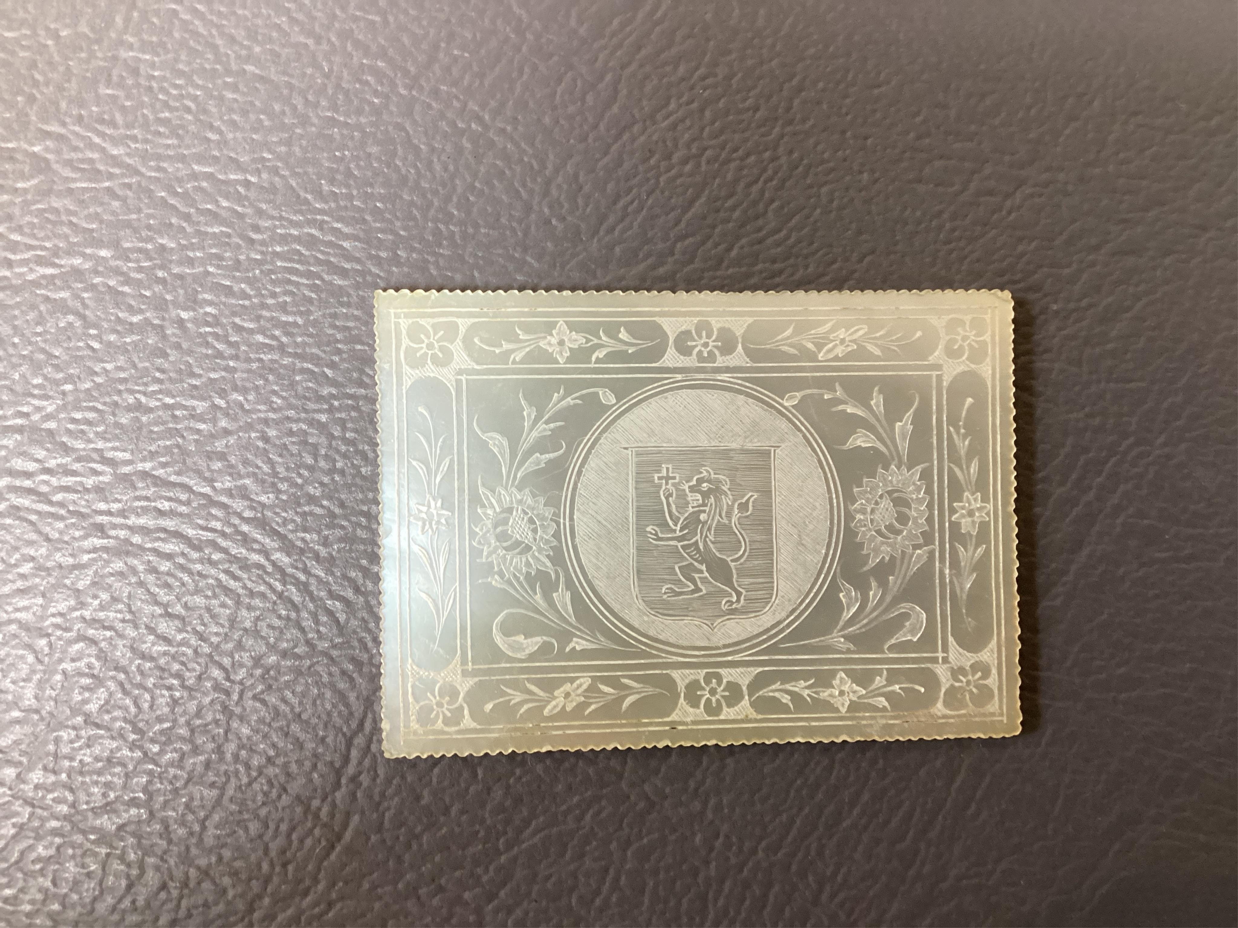 Two Chinese gilt decorated black lacquer games boxes, containing numerous mother-of-pearl counters, 19th century